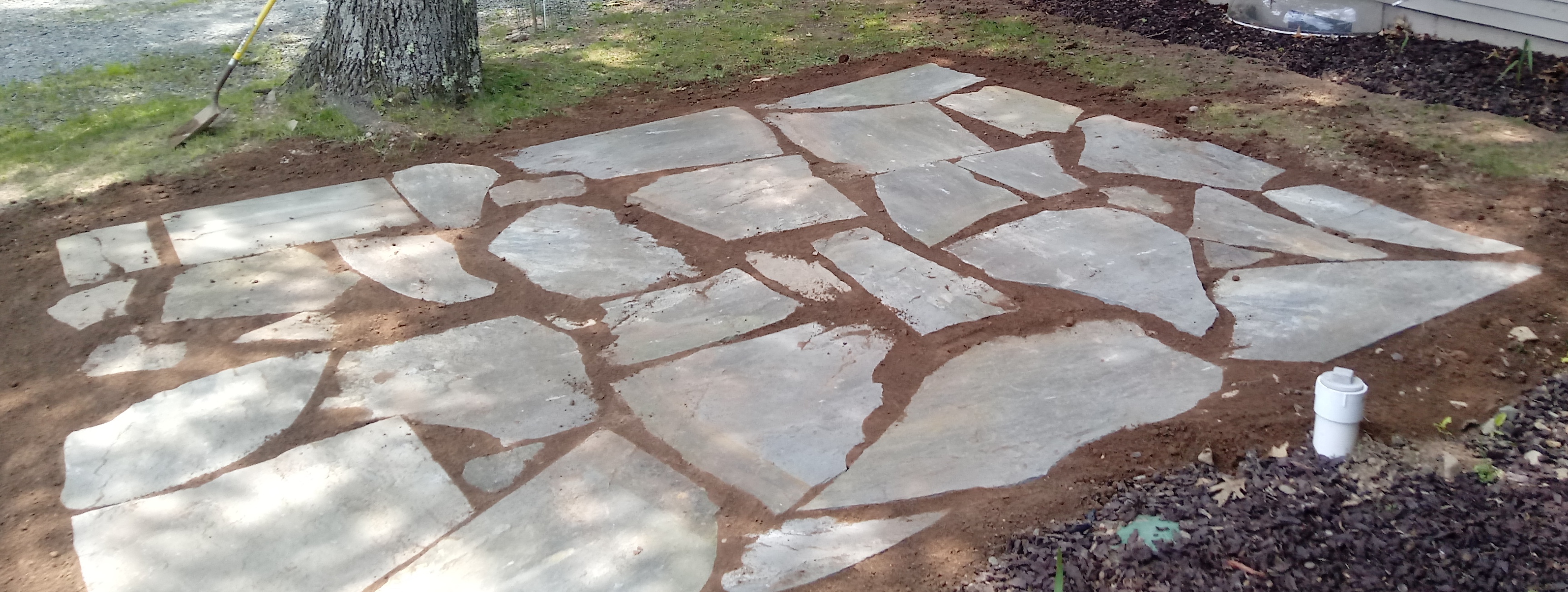 Irregular PA Bluestone Patio by Apple Creek Landscaping LLC